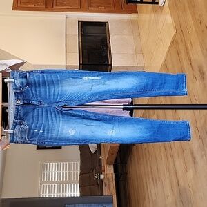 WHBM Mid- rise skinny distressed jeans